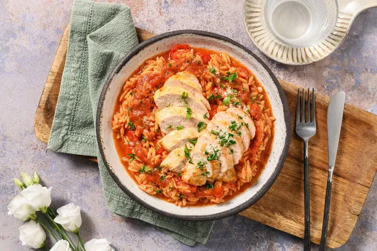 Double Chicken Breast on Creamy Tomato Orzo
